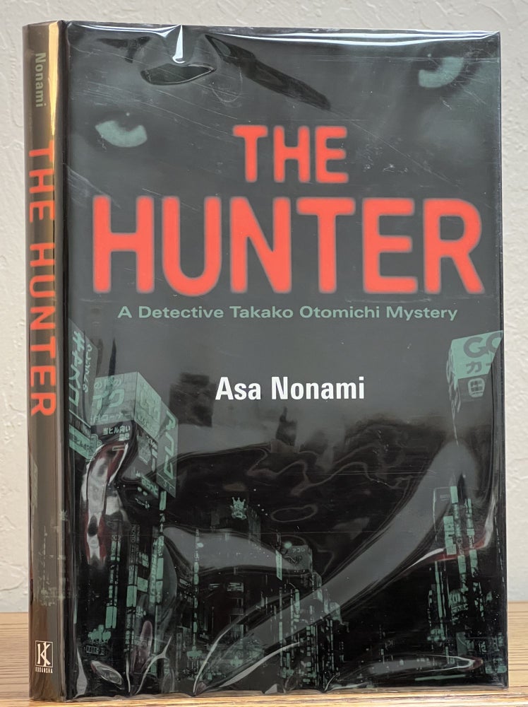 Item #30613 The HUNTER. A Detective Takako Otomichi Mystery.; Translated by Juliet Winters Carpenter. Asa Nonami.