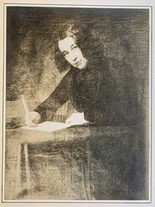 Item #52316 MOUNTED SILVER GELATIN PHOTOGRAPH Of A YOUNG DICKENS, Seated at a Writing Table,...